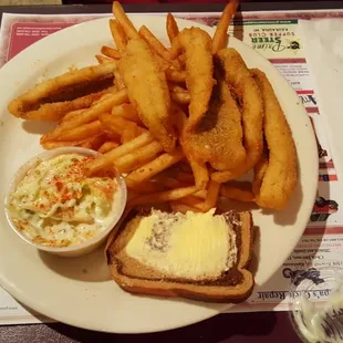 a plate of french fries with a side of coleslaw