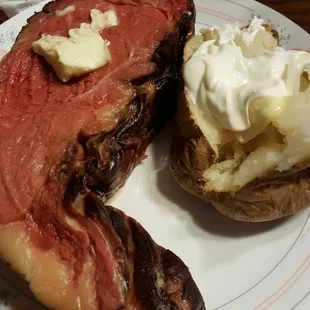 a plate of meat and potatoes