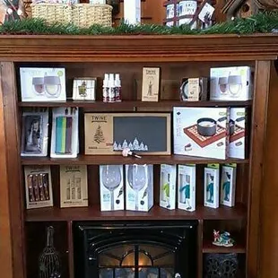 a wine rack with wine bottles and wine glasses