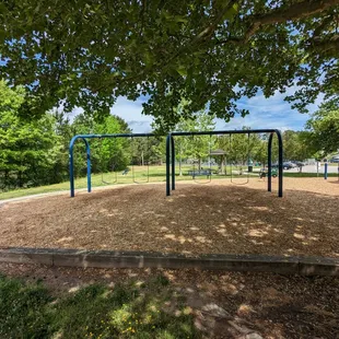 This is one of several views of the original playground before replacement.  Photo taken April 22, 2023.