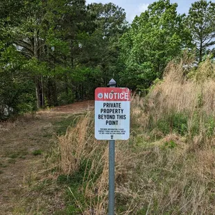 This is a view of the sign where the park ends and private property begins.  Photo taken April 22, 2023.