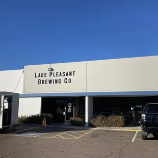 a truck parked in front of a building