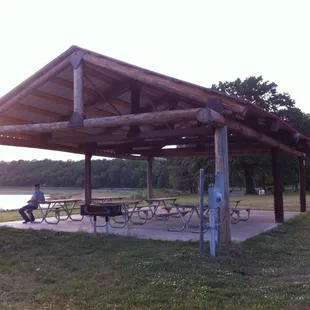 Covered shelter with grill