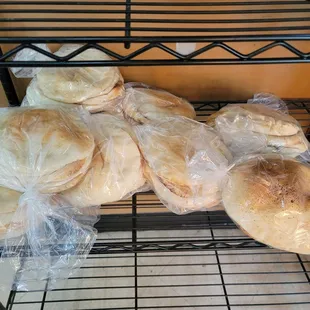 bread rolls in plastic bags