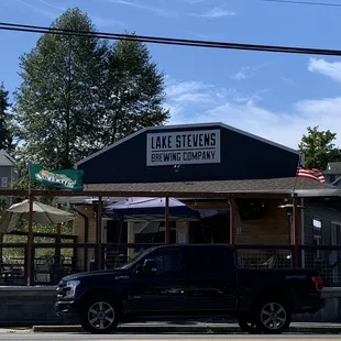 a truck parked in front of a building