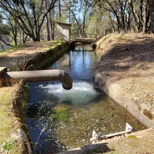 You will have to climb over this pipe to continue on the trail