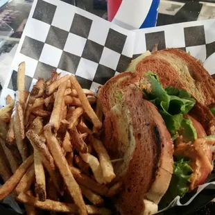 The &quot;Lightning BOLT&quot; (Bacon Onion Lettuce Tomato) serviced on sundried tomato pesto bread with avocado and sundries mayo.