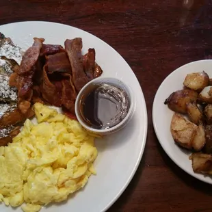2 eggs scrambled with bacon and french toast and a side of home fries. I recommend highly!