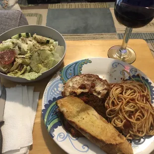 Eggplant parmigiana with spaghetti and salad --pick up from restaurant