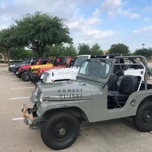jeeps parked in a parking lot