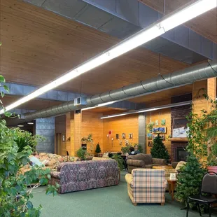 a living room with couches and a fireplace
