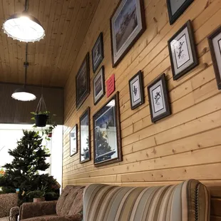 Art for sale by local artists on the wall.