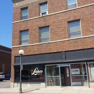 a brick building with a storefront