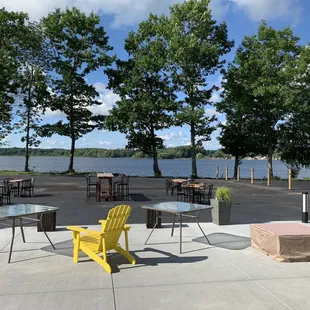 tables, chairs, and a fire pit