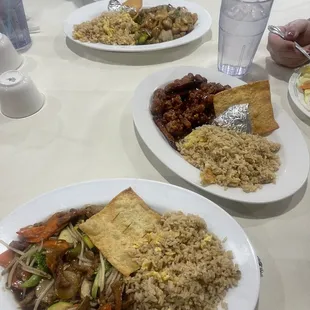 Bottom #5 Chow Mein Pork, middle Orange Chicken and top Garlic Chicken. Interesting piece of square toasted bread was tasty.