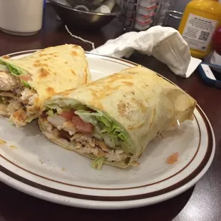 Not on the menu. Chicken Shawarma type of wrap. Ask your server for it!