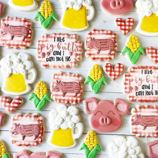 decorated cookies with a pig, corn, and beer