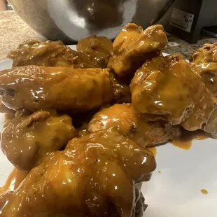 chicken wings covered in caramel sauce