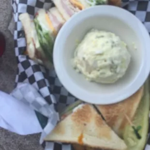 Club sandwich and homemade potato salad.