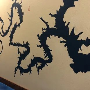 When I first took a look at this, I was confused as why they would have a Chinese Dragon on the wall of a sandwich shop! It's the lakes!!!