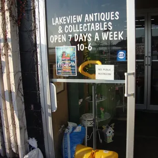 Hours of operation, front entry door.