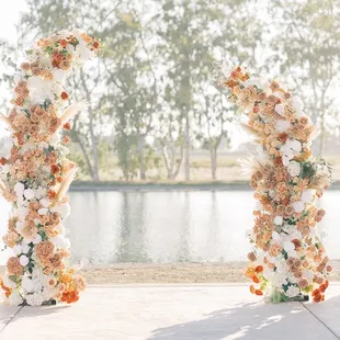 a wedding arch decorated with flowers