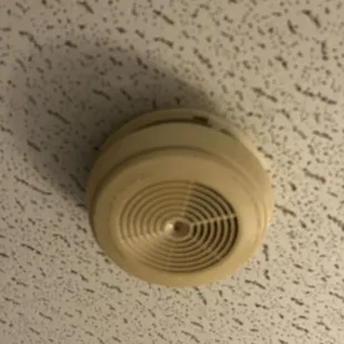 Smoke detector. Sticky from nicotine tar