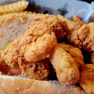 a basket of fried chicken and fries