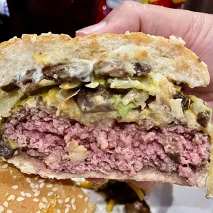 Mushroom cheeseburger cooked medium rare