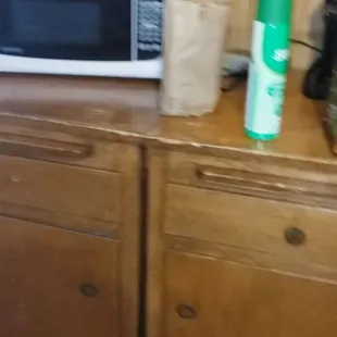 Make shift kitchenette...the counters,  cabinets and cutting boards were filthy..