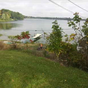 Fishing area with dock and bonfire pit