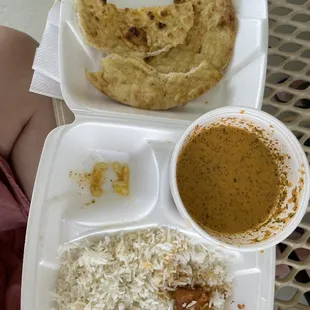 Butter chicken with naan and rice
