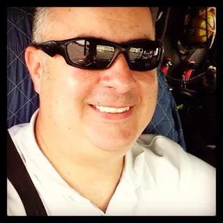 Scott E.