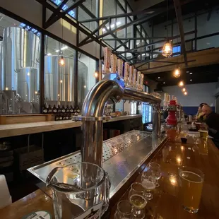 a bar with beer taps
