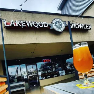 a glass of beer on a table