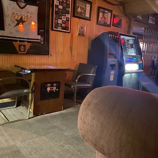 a game room with arcade machines