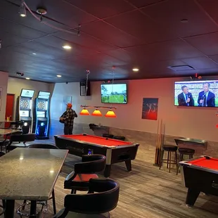Dart boards, pool tables