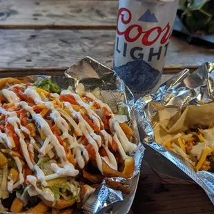 Loaded nacho fries and a street taco