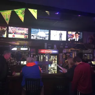 people sitting at the bar