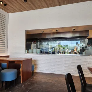 a view of the kitchen from the dining room
