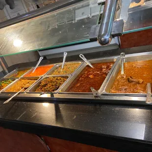 a buffet with a variety of food items