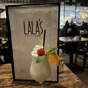 Piña Colada (blended) with whipped cream added on top!