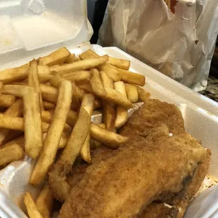 a box of fried chicken and french fries