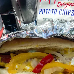 a hot dog wrapped in foil