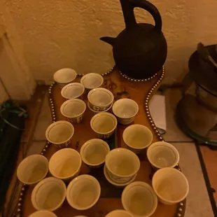 a tray of cups on a table