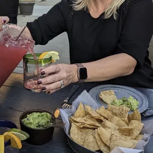 Red Sangria with fresh tortilla chips and House-Made Chunky Guac*