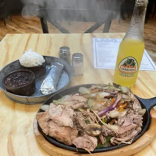 Mongolian fajitas with pork carnitas and pineapple jarritos