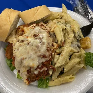 My coworker ordered Lalos and this was really good. Chicken Parmesan with pasta and salad and bread.