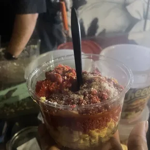 Corn in a cup (with crushed flaming hot Cheetos)