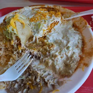 1 Cheese enchilada, 1 chicken taco rice and beans. Combo plate #1